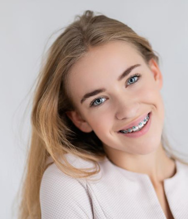 Smiling teen girl with braces