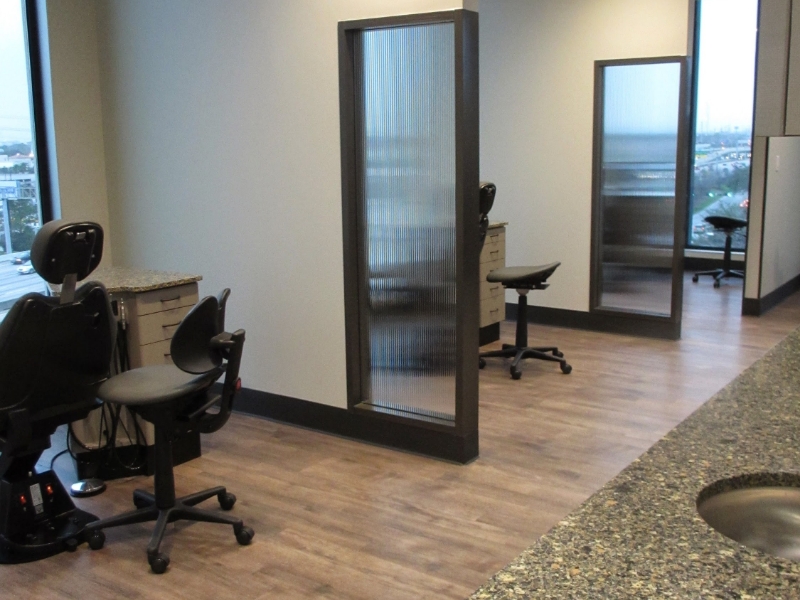 Two adjacent orthodontic treatment rooms