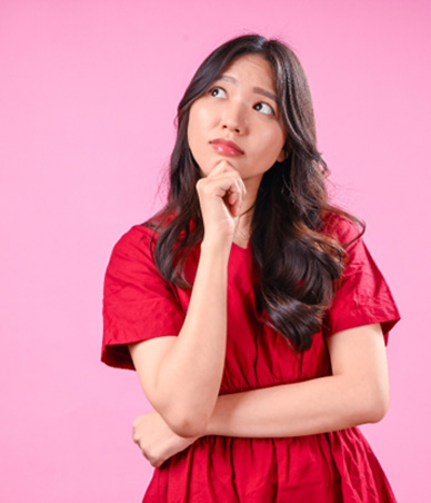 Woman wearing thoughtful, curious expression