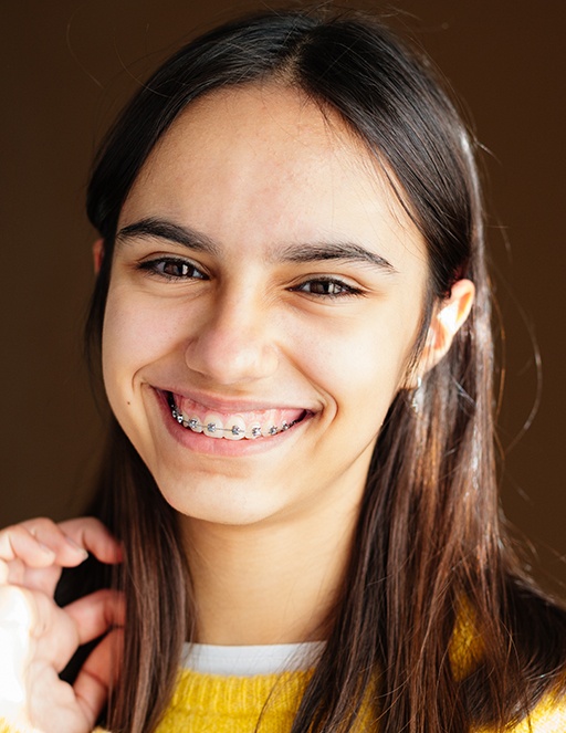 Smiling teen girl with braces