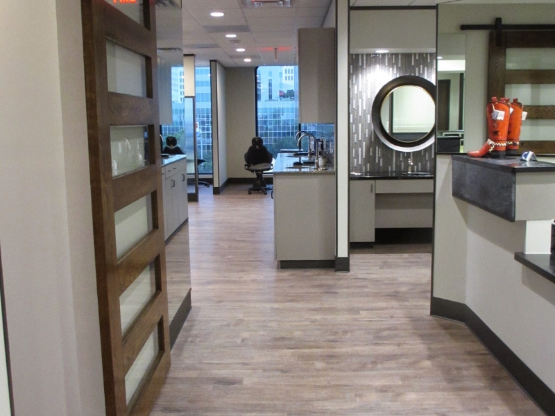 Hallway with front desk and sanitation area visible